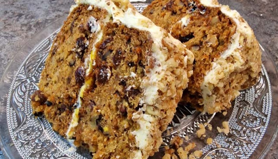 Vegan Carrot Cake with Orange Frosting and Passion Fruit Coulis